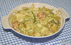 Vegetable cheesy pasta bake in an ovenproof dish