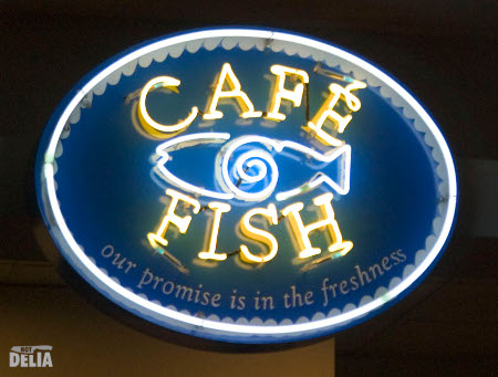 Neon sign for the Caf&eacute; Fish in Bangkok's Emporium shopping mall