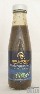 A bottle of Blue Elephant black pepper sauce
