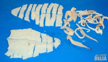Two squid completely ready for the pot - cleaned, trimmed, scored and sliced