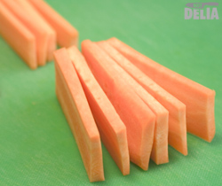 Rectangular slices of carrot ready for cutting into juliennes
