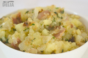 Fried potatoes with bacon and onion