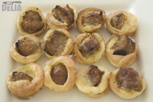 Mini toads-in-the-hole - sausage baked in batter