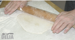 A rolled flat sheet of pancake dough
