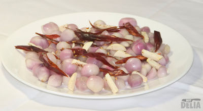 Onions, sliced garlic and sliced chillies ready for pickling