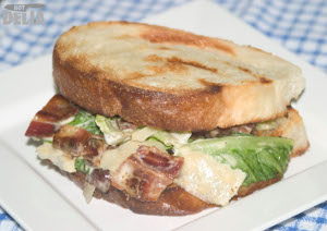 Caesar salad sandwich on fried bread