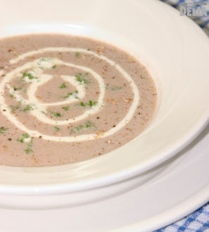 Silky leek and red wine soup in a bowl