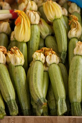 Courgettes with their flowers still attached