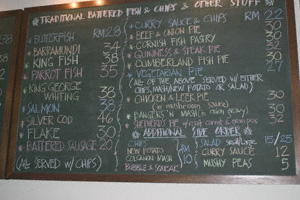Blackboard with a food menu written in coloured chalks