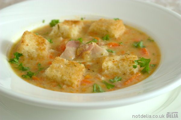 Cream of lentil soup with bacon and croutons
