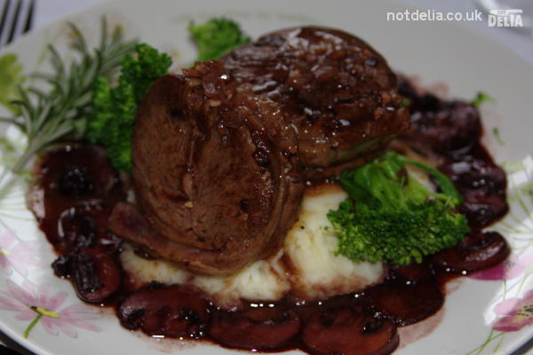 Venison with celeriac mash and blackcurrant & red wine sauce